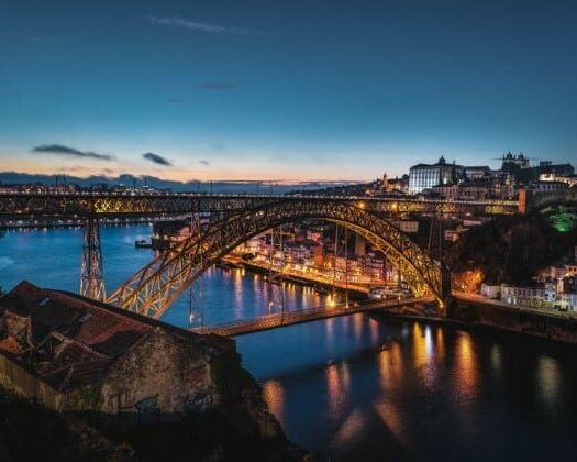 a view of a bridge near water for those wondering is portugal safe