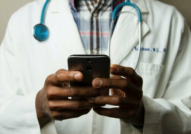 A doctor analyzing the cost of healthcare in Portugal 